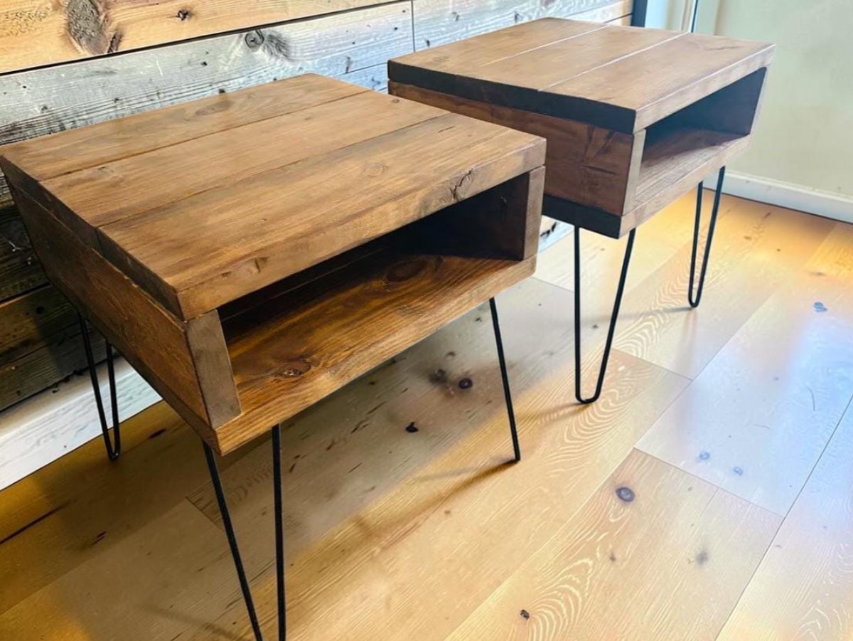 Pair of wood end tables with open storage shelves and black hairpin legs