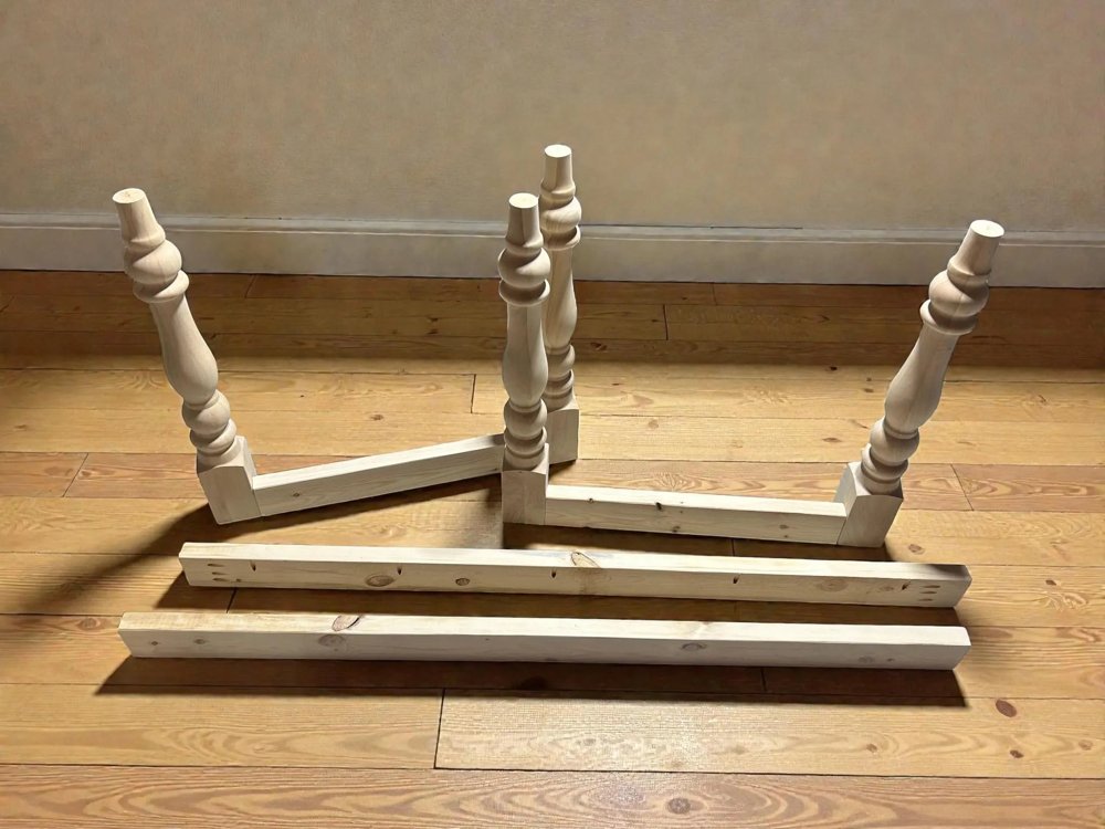 Unfinished turned-leg base and pine apron from this product listing